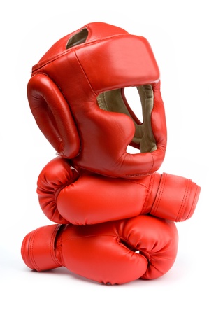 An image of red gloves and helmet for boxingの写真素材
