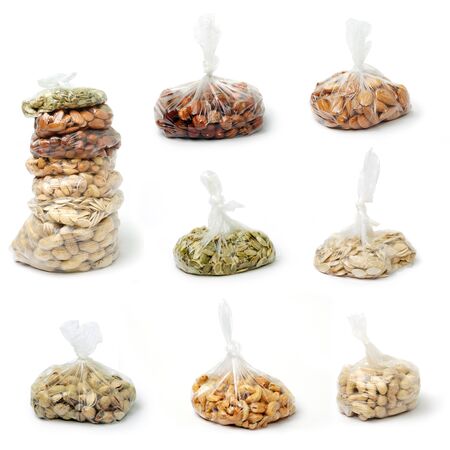 An image of a set of nuts in cellophane bagsの写真素材