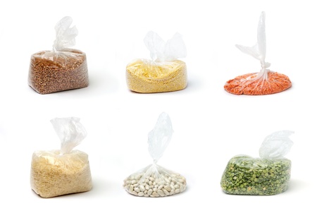 An image of a set of groats in clear bagsの写真素材