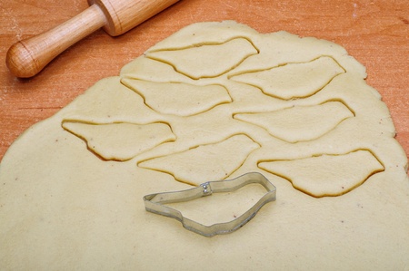Sweet cookies in the shape of birds on the tableの写真素材