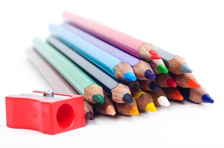 Sharpened pencils and sharper on white paperの写真素材