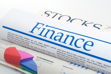 financial newspaper with stock market graphicsの写真素材