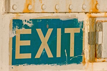 old rusty exit sign