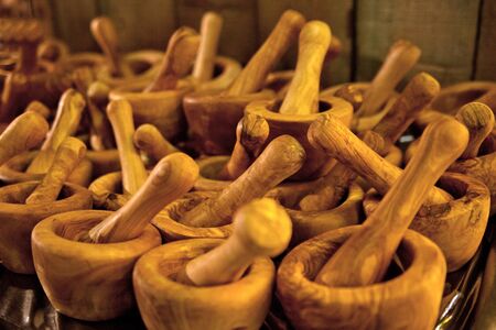 Mortar and pestle made from woodの写真素材