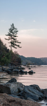 Rocks on the lakes coast at sunrise