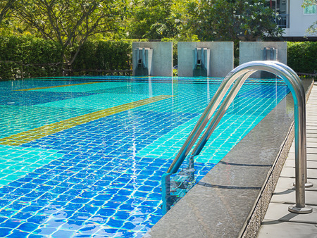 Swimming Pool in Condominium on Sunny Dayの写真素材