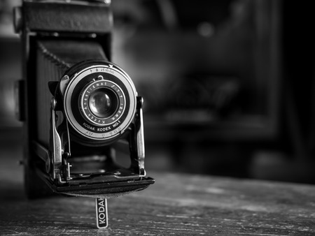 56 ART STUDIO, NAKHONSAWAN, THAILAND - April 13, 2018 : Old Vintage Kodak Camera on Wooden Backgroundのeditorial素材