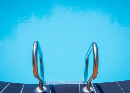 Stair Ladder to Curve Swimming Poll on Sunshine Day Summer Time