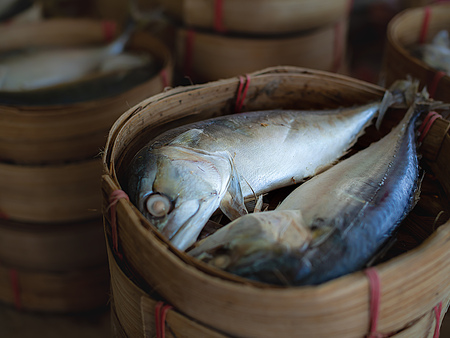 Mackerel Fishes (Thai mackerel fish steamed) in Round Bamboo Basket in The Summer Fresh Marketの写真素材