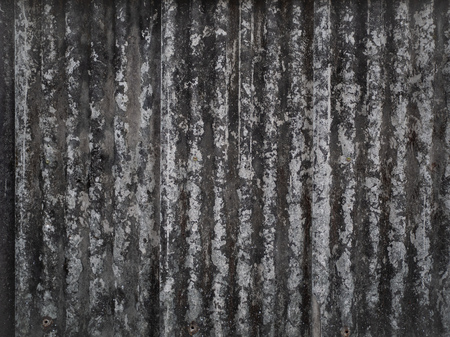 Old grunge ceramic roof tiles wall background and texture.の写真素材