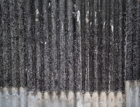 Old grunge ceramic roof tiles wall background and texture.の写真素材