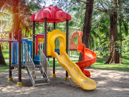 Colorful playground in public park on sunny day.の写真素材