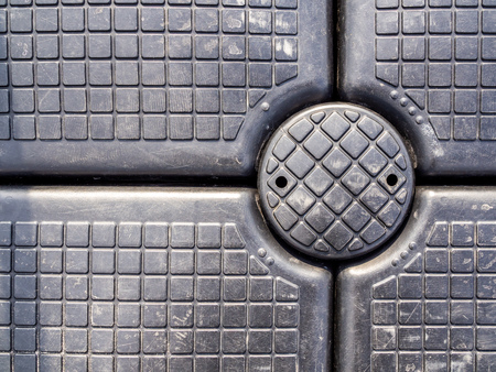 Close-up dirty plastic pontoon walk way texture background. Black plastic Floating Dock.の写真素材
