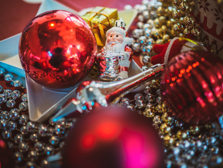 Small cute Santa Claus with Christmas ornament decoration background.の写真素材