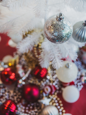 Christmas ornament decoration background. Christmas balls on white Christmas tree.の写真素材