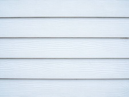 Close-up old white wood texture background. Rustic white wall made of wooden planks. Wooden texture.の写真素材