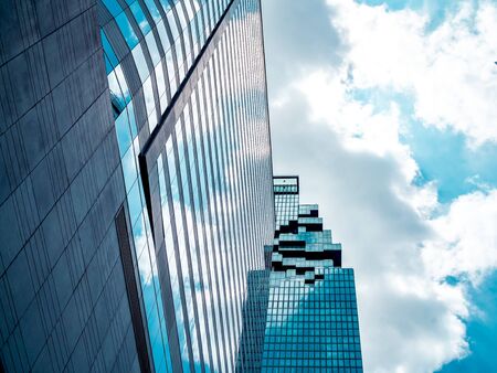 Bangkok, Thailand - June 22, 2019. Bottom view of Mahanakhon building on blue sky and cloud background on sunshine day, Mahanakhon building that in the central business district of Bangkok, Thailand.のeditorial素材