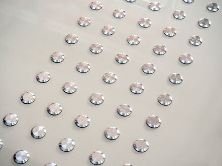 Close-up metallic dot tactile floor, blind path for blind people.