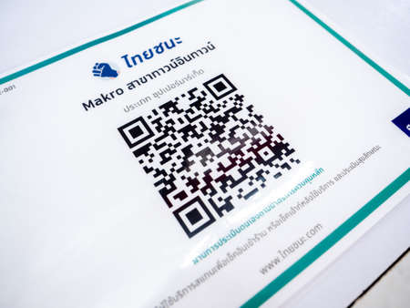 BANGKOK, THAILAND - May 21, 2020:"Thai Chanaâ Application to Curb COVID-19, scanning QR code for registers entry and exit the place, preventive measure for COVID 19 situation.のeditorial素材