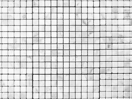 White marble grid wall background. Abstract square with small of many rounded corners tiles pattern...