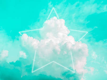 Blank star shape white glowing light frame on dreamy fluffy cloud with aesthetic green neon sky background. Abstract minimal natural luxury background with copy space.の写真素材