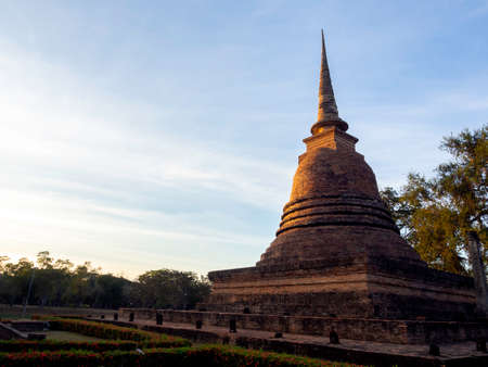 Beautiful scene of old ancient pagoda on blue sky background with copy space, at Sukhothai Historical Park, a UNESCO World Heritage Site in Thailand.のeditorial素材