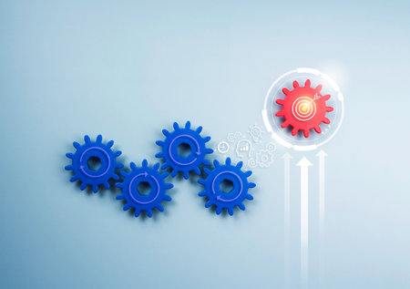 Business growth and success, unique, different, development, revolution, innovation, leadership. Target icon on red gear with up arrows and business strategy icon on blue cogwheels on blue background.の写真素材