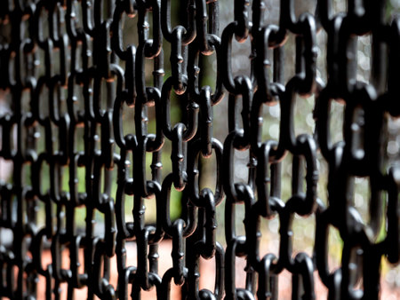 Chain background. Abstract high contrast old grunge texture chains wall background.の写真素材