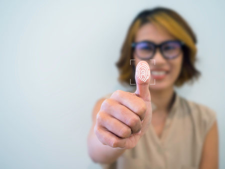 Fingerprint icon with woman thumb wearing glasses scanning for security access with biometrics...