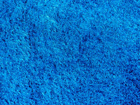 Carpet blue texture. Close-up clean blue rug background.
