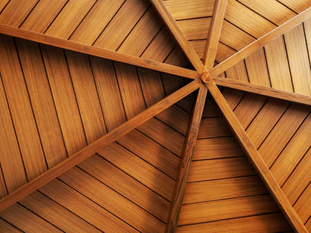 Wooden construction background, arranged to round shape, under the roof. Interior structure of a domed wood plank ceiling, circle pattern, spider web style.の写真素材