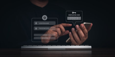 Two steps authentication or 2FA concept. 2023 Verification code and key icon on smart phone screen with keyboard computer for validate password page, Identity verification, cyber security technology.の写真素材