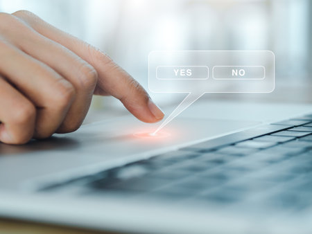 Yes or No concept. Yes and No buttons window in virtual speech bubble appear while finger of person...
