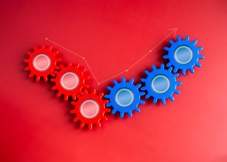 Development of growth line graph appear on moving blue and red gears on red background. Business success, strategy, organization management and solution, teamwork and connection technology concepts.の写真素材