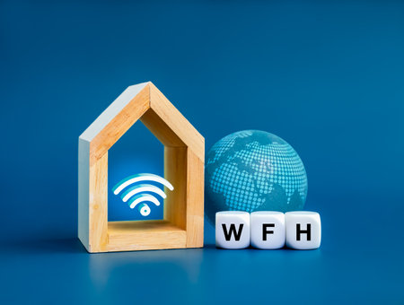 Work from home, remote working and freelance concepts. Text "WFH" on white cube block and 3d wifi icon symbol appear in modern wood house near digital world isolated on blue background, minimal style.の写真素材