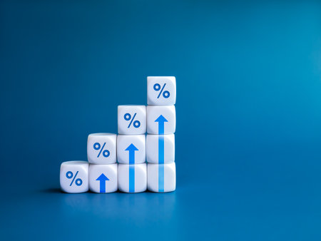 Rise up arrow on white cube blocks, bar graph chart steps with percentage icon isolated on blue background. Business growth process, profit, wealth, leader trends, economic improvement concepts.の写真素材
