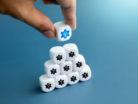 Leadership, business solution, solve problems, creative idea and innovation concepts. Light bulb gear icon block in hand put on top of question symbols block stacked pyramid shape on blu background.の写真素材