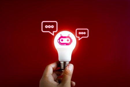 AI chat bot for creativity concept. Digital smart robot assistant  with speech bubbles icon in lightbulb. Inspiration and idea searching automatic service with artificial intelligence technology.の写真素材