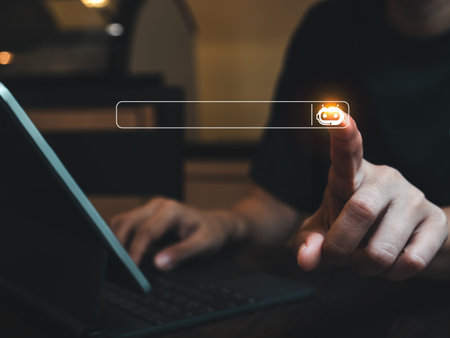 AI searching technology concept. Search engine bar with empty space for text and robot icon button, data search optimization by artificial intelligence while businessman work with laptop computer.の写真素材