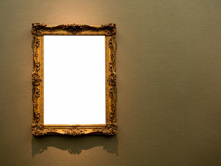 Mockup white blank space in classic gold wooden square louise style frame hanging isolated on dark...