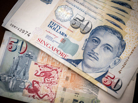 Singapore dollar money background. 50 Close-up Singapore dollars currency banknote. Business finance...