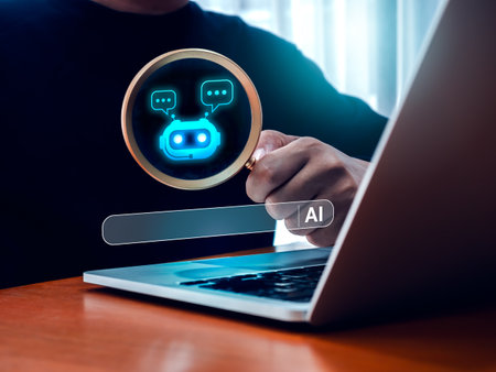 AI search engine optimization tools, SEO online technology concept. Searching bar appear while businessman hold magnifying glass with chat bot icon inside while work with laptop computer on table.の写真素材