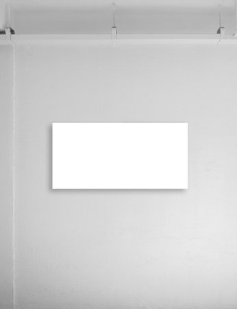 Empty white blank rectangle sign frame mounted on white wall in the  buildings, vertical background. Mockup floor sign, signage frame or poster for advertising and information.の写真素材