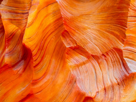Abstract bright orange color of wall cave scene background. Image of beautiful lower stone canyon...