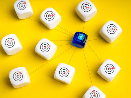 AI solutions, Artificial Intelligence for business efficiency, technology concept. AI chip icon on blue dice, connecting to other white dices with goal target symbol, on yellow background, minimalist.の写真素材