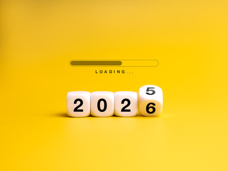Happy new year 2026 coming soon. Loading progress bar, 2025 changing to to 2026 calendar year numbers on white flipping dice, isolated on yellow background, minimalist trendy style concept banner.の写真素材
