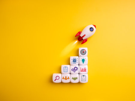 Business growth and startup concept with rocket launching above stacked dice with strategy icons. Represents planning, innovation, teamwork, goals, marketing, and successful startup development.の写真素材