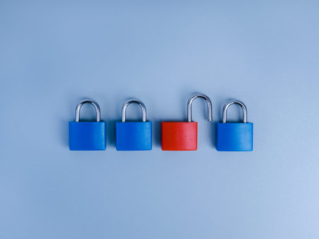 Blue locked and red unlocked padlocks representing cybersecurity, data security, access control, authentication, identity protection, vulnerability, security breach, risk managemen
