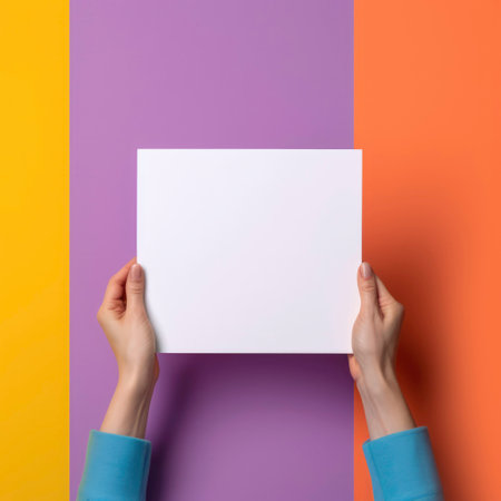 Hands holding an empty white board on a colorful background, for png. Generated by AIの素材