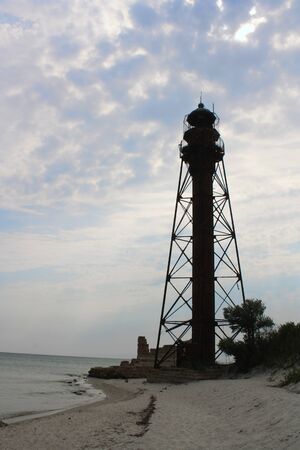 Old lighthouse on the beachの写真素材